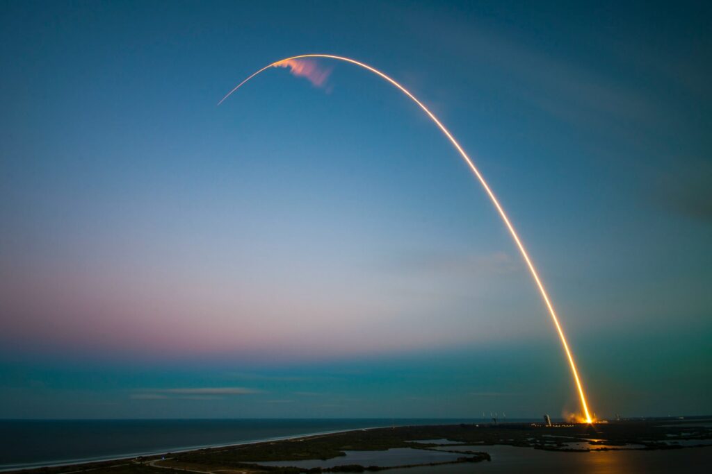 Nasa's Falcon 9 rocket takes off at dusk with incredible speed and precision.